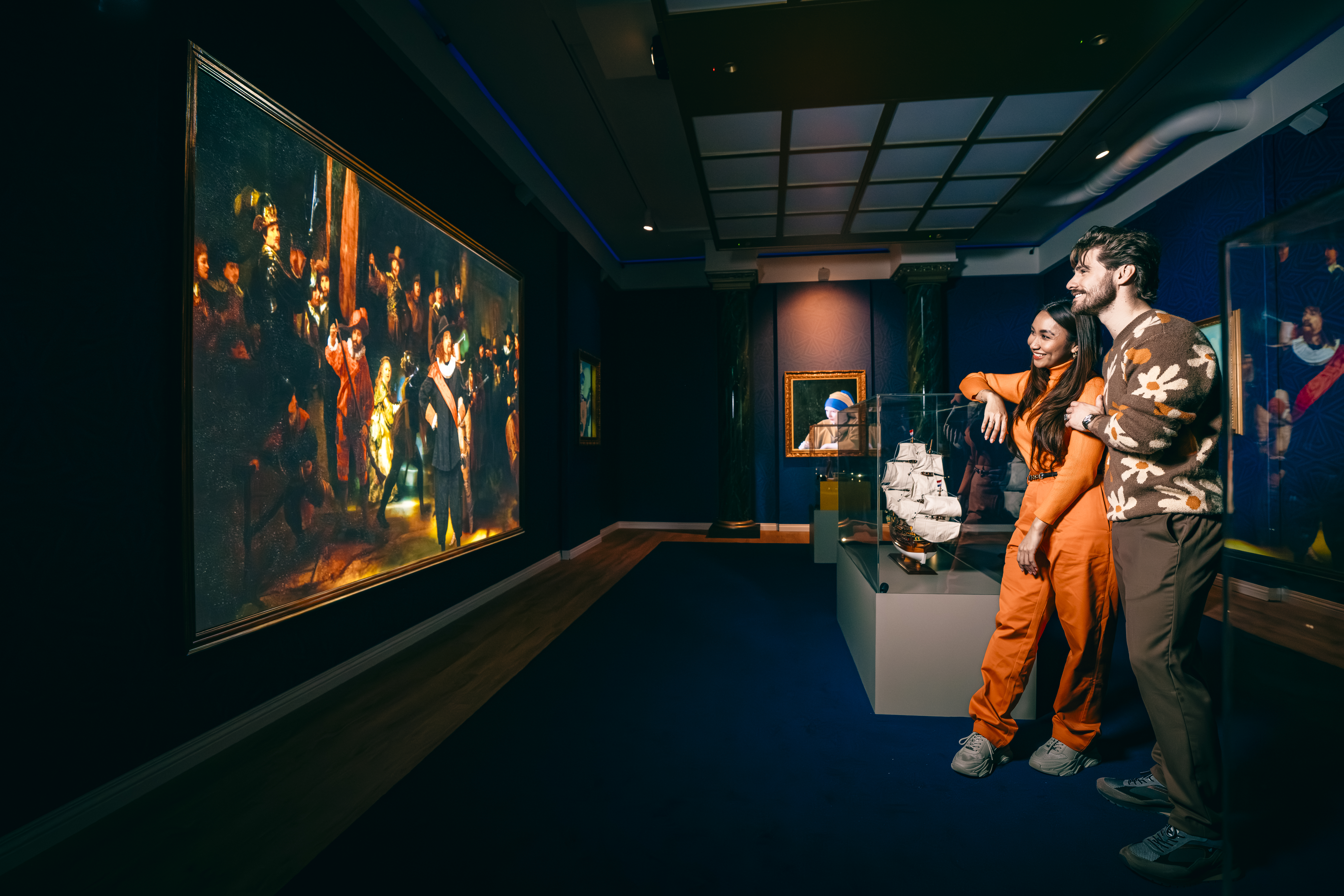 Visitors discover colorful digital exhibits during an interactive experience in AmsterdamVisitors discover colorful digital exhibits during an interactive experience in Amsterdam